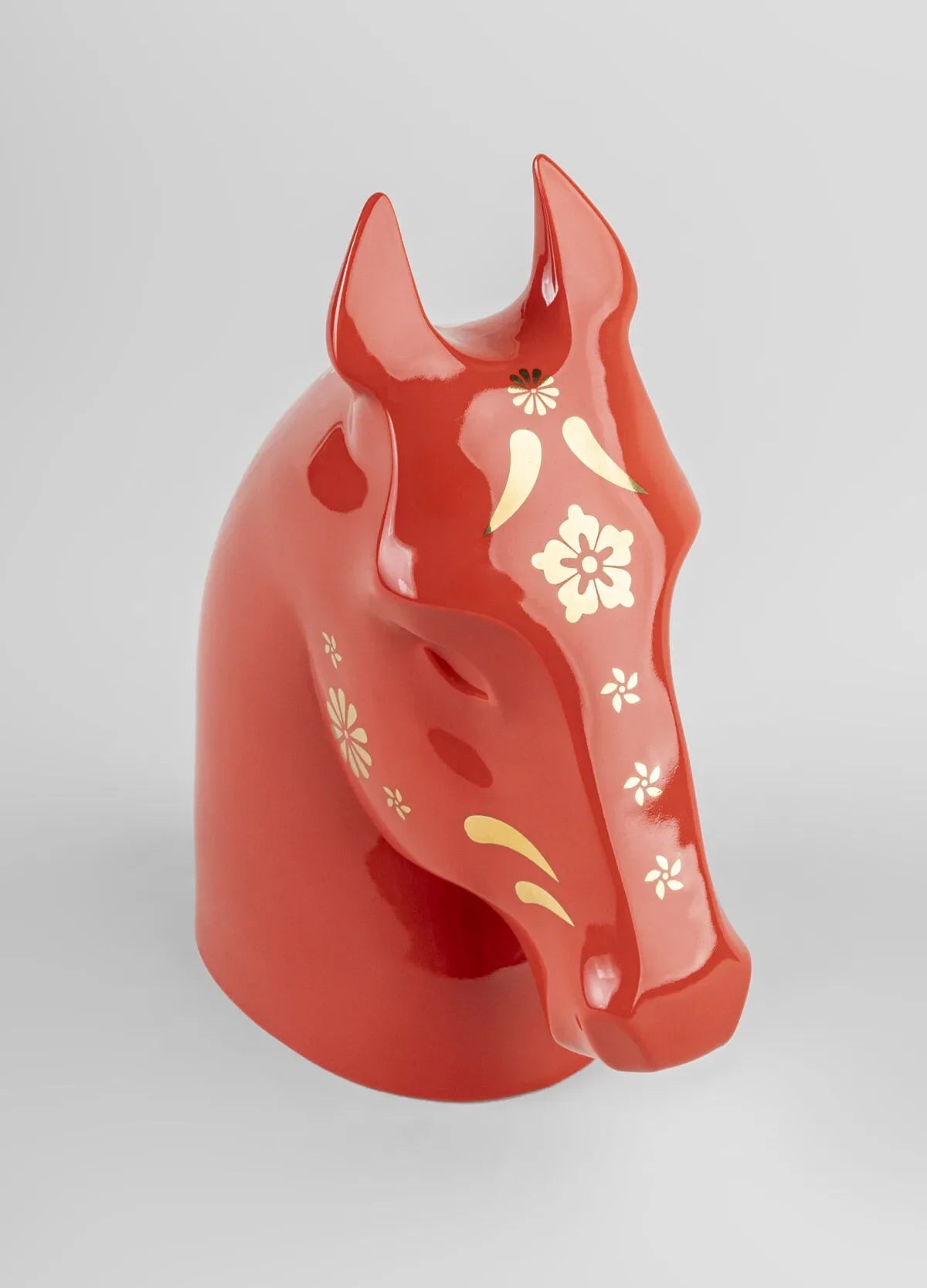 Lladro The Horse Sculpture. Red - gold-Goviers